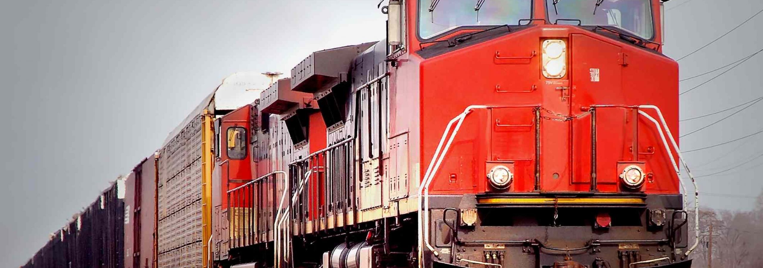 Freight train on railroad tracks, representing exposure risks leading to cancer claims and a Tennessee railroad workers cancer lawsuit.