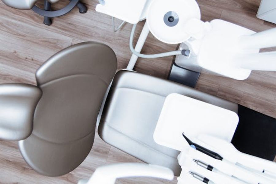 A chair at a dentists examination room.