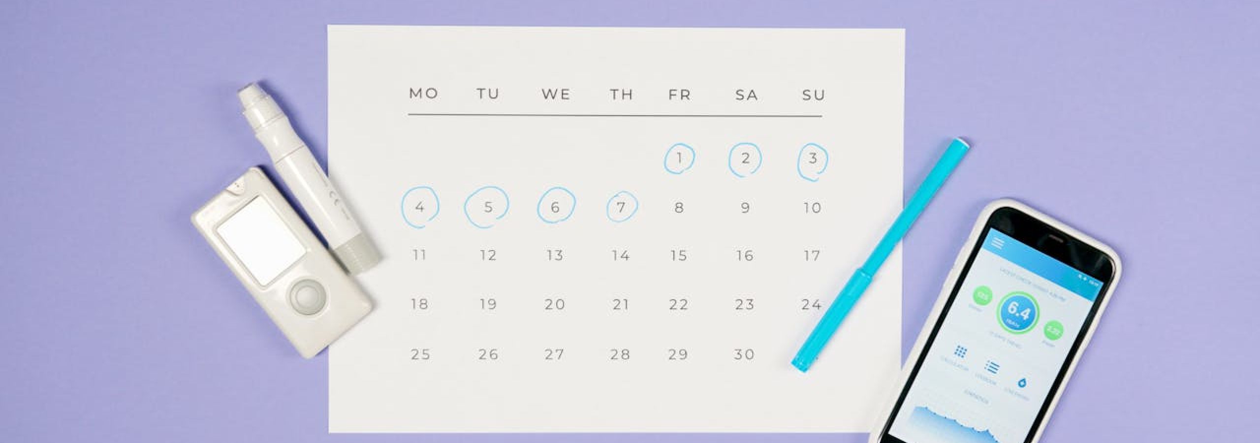Photo of a glucose monitor and associated app