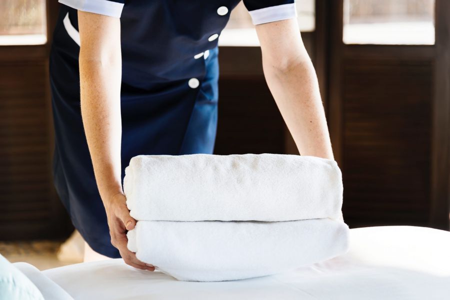 hotel staff folding towels and bedding hotel staff folding towels and bedding hotel staff folding towels and bedding