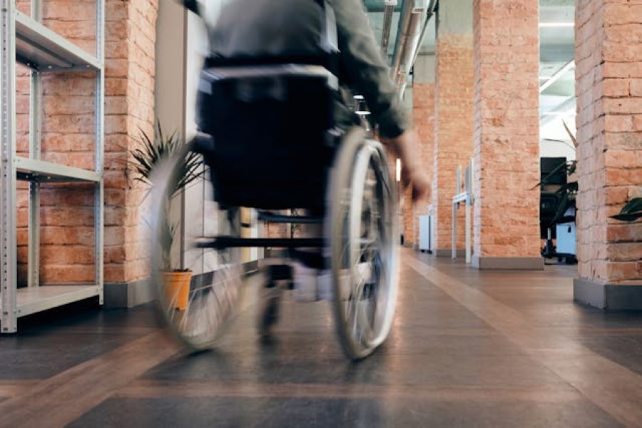 A man in motion in a wheelchair