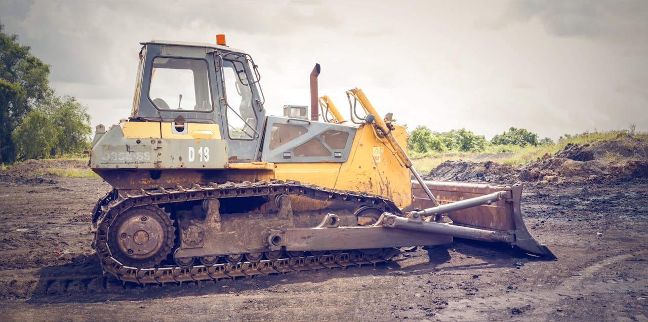 photo of bulldozer on construction site