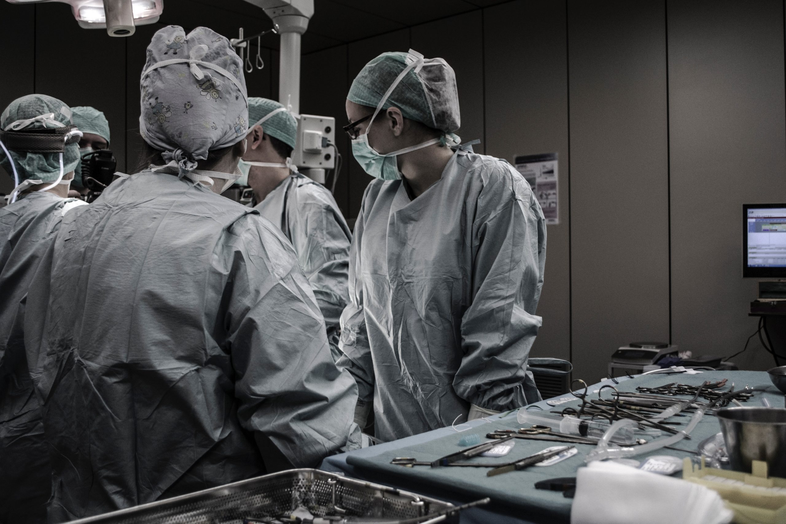nurses and doctors in surgery